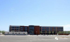 the middle school building, still in process of construction